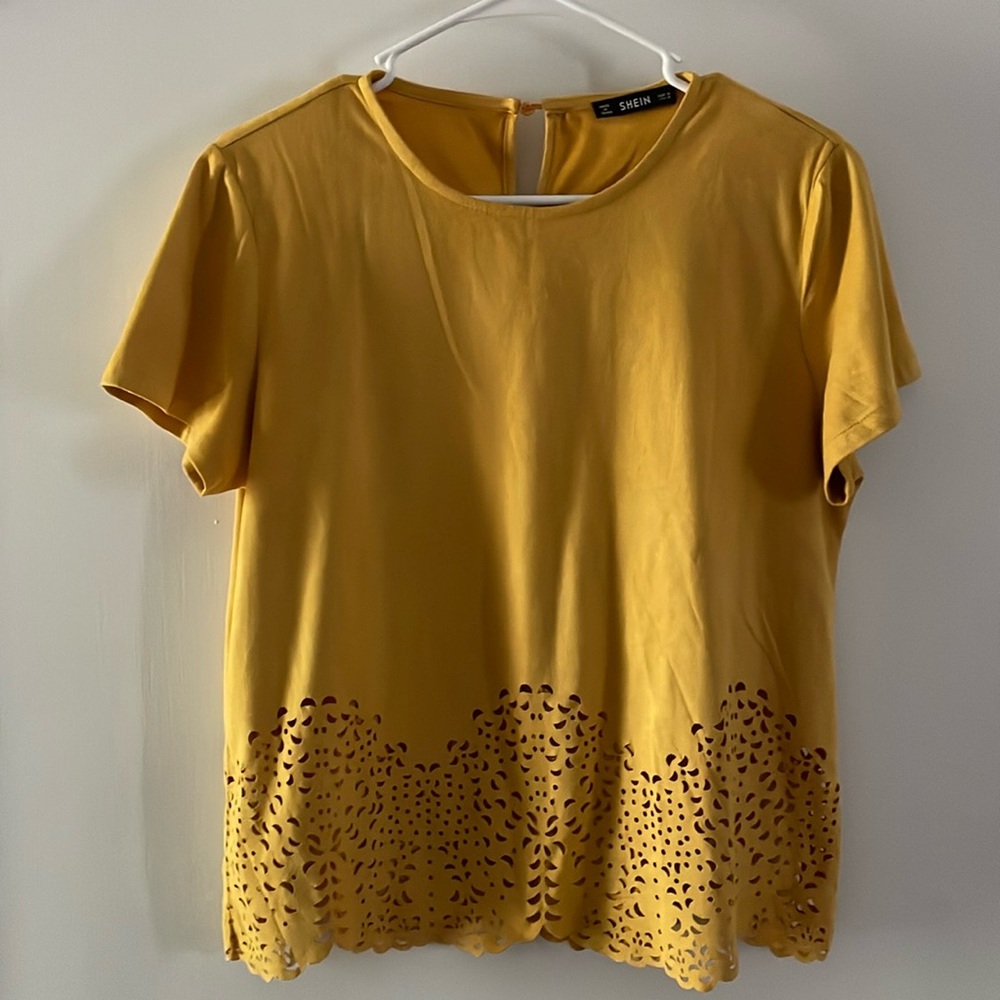 Yellow gold die cut floral suede top